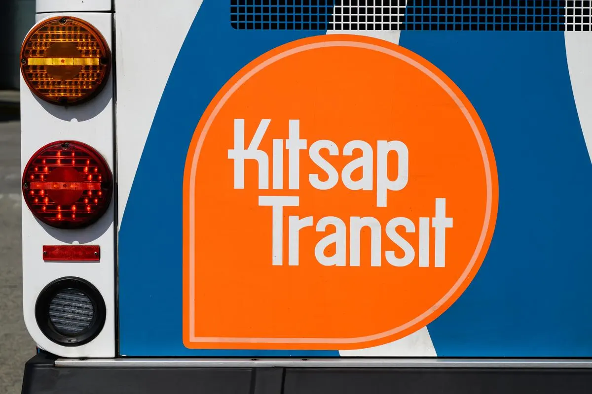 Close-up of the Kitsap Transit logo on the rear of a public transit bus in Bremerton, Washington