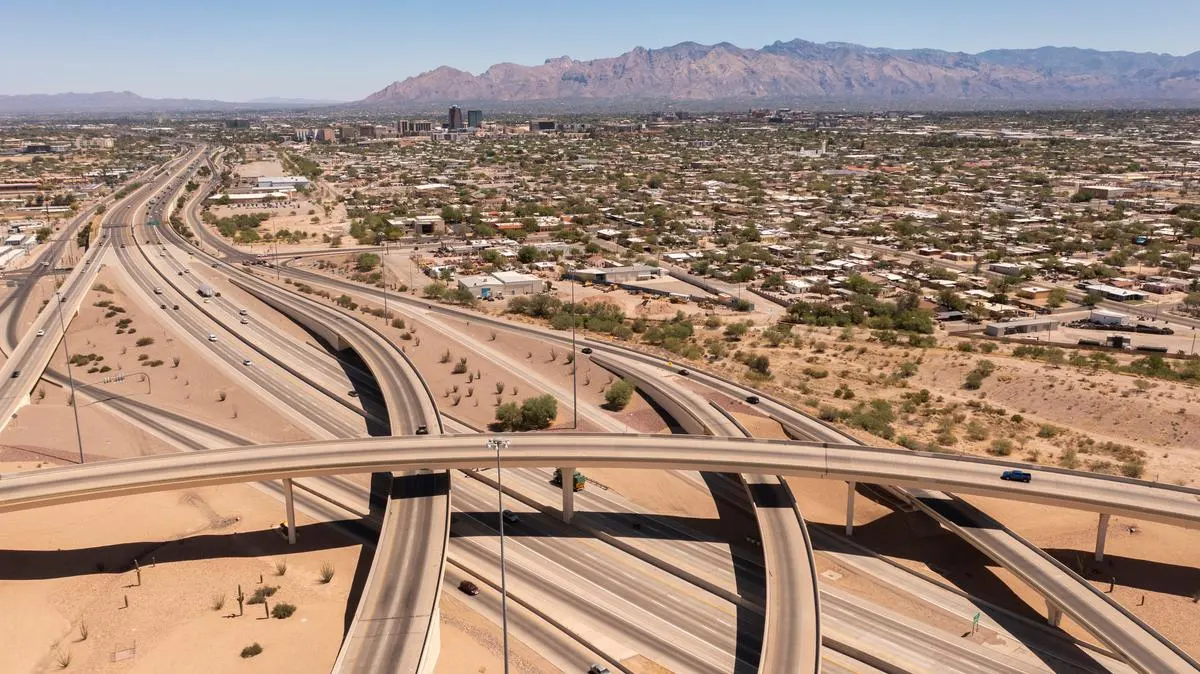 Daytime aerial view of the Interstate 10 and Interstate 19 freeway interchange in south Tucson, Arizona