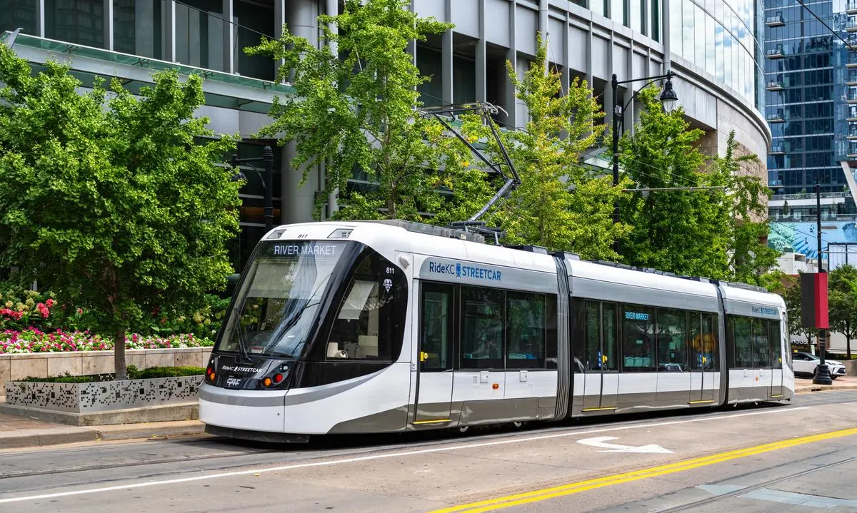 Kansas City Streetcar with RideKC branding moving along Main Street in downtown Kansas City, Missouri