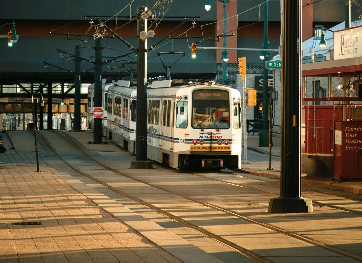 NFTA Metro light rail train in downtown Buffalo, New York, with overhead electric catenary wires