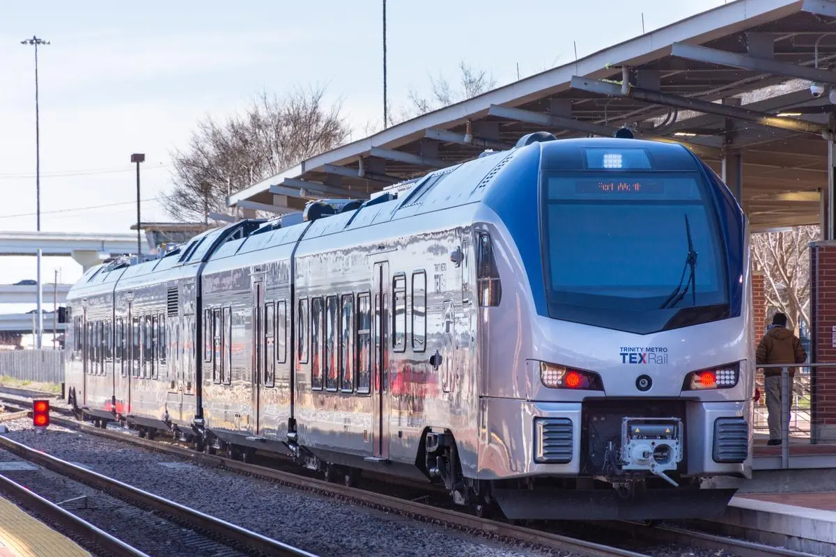 Trinity Metro TEXRail commuter train arriving at Fort Worth Central station in Fort Worth, Texas